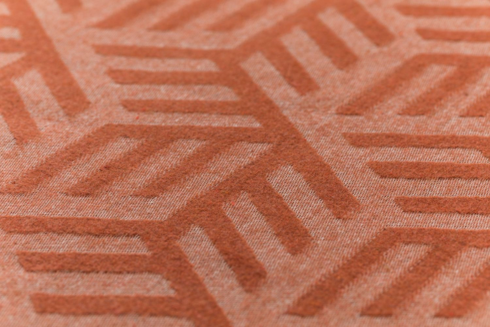 David Fussenegger Wohndecke Riva 'Hexaflow' 140 x 180 cm Kupfer- Orange