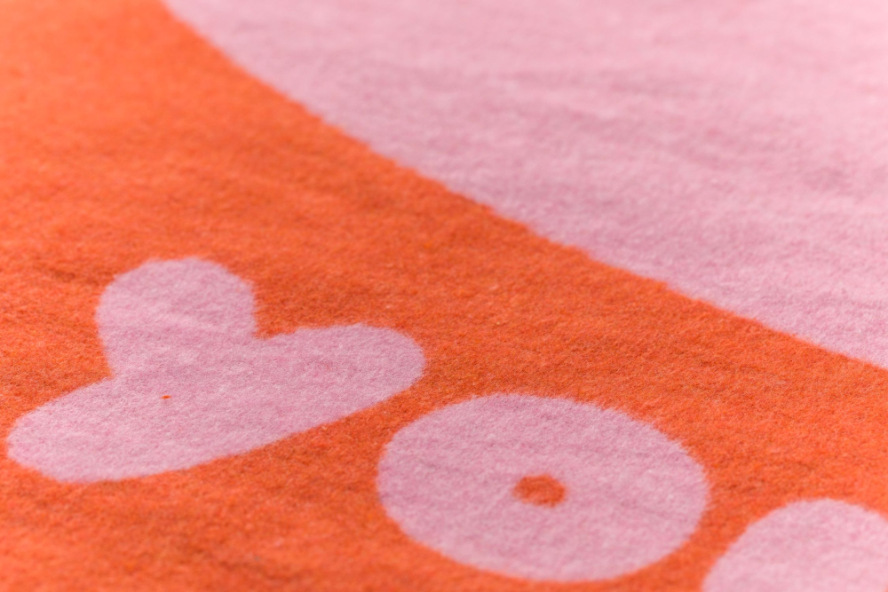 Preview: David Fussenegger Wohndecke Silvretta 'Love' 140 x 200 cm Dunkelorange