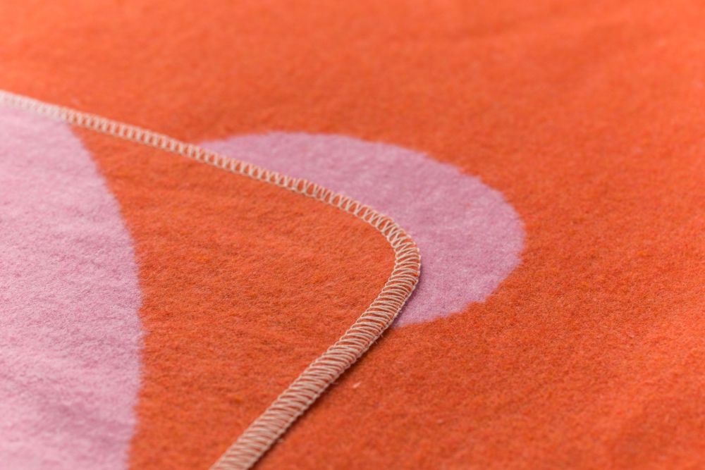 Preview: David Fussenegger Wohndecke Silvretta 'Love' 140 x 200 cm Dunkelorange