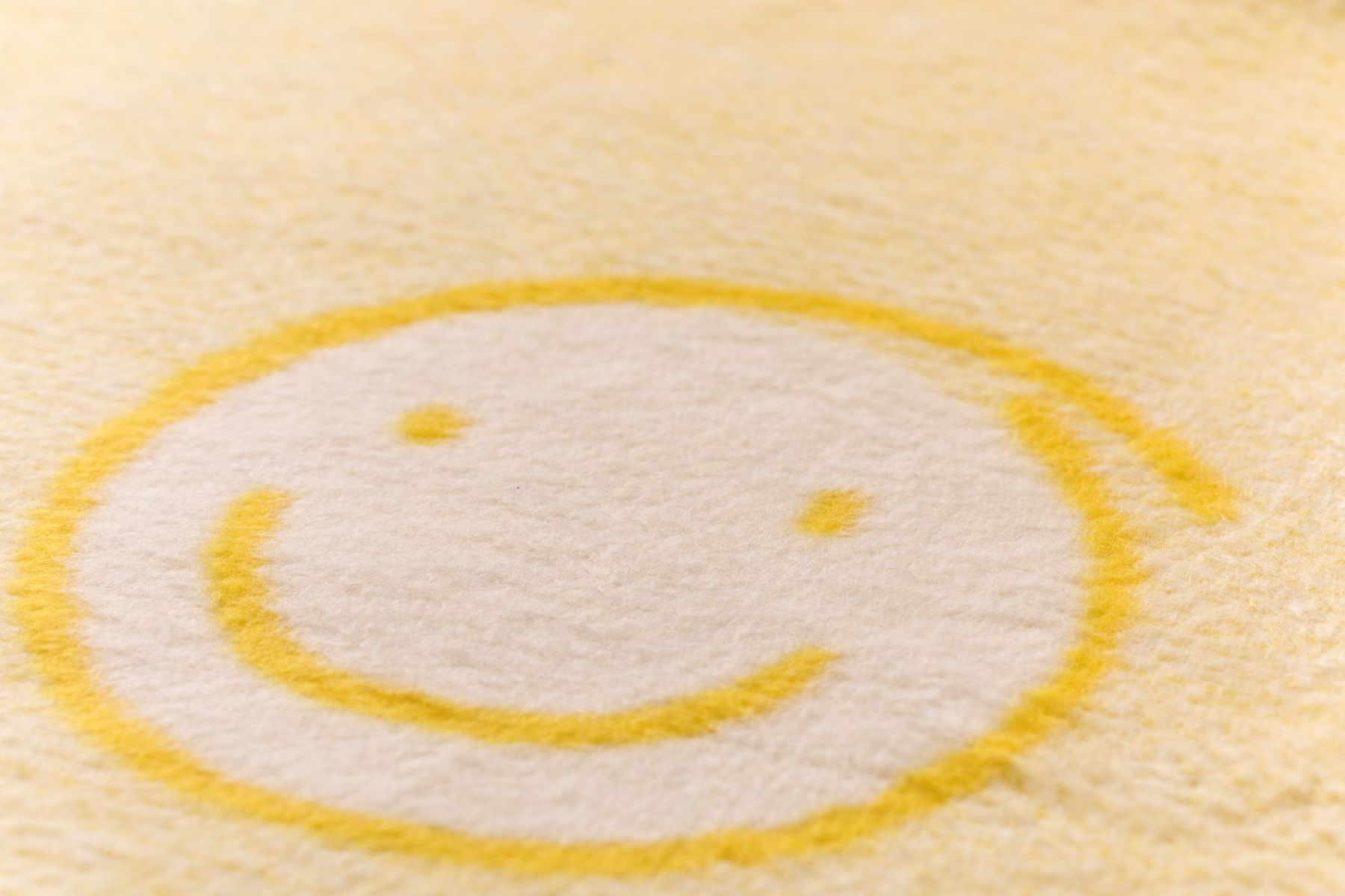 David Fussenegger Kinderdecke Mila 'Happy Faces' 150 x 200 cm Gelb